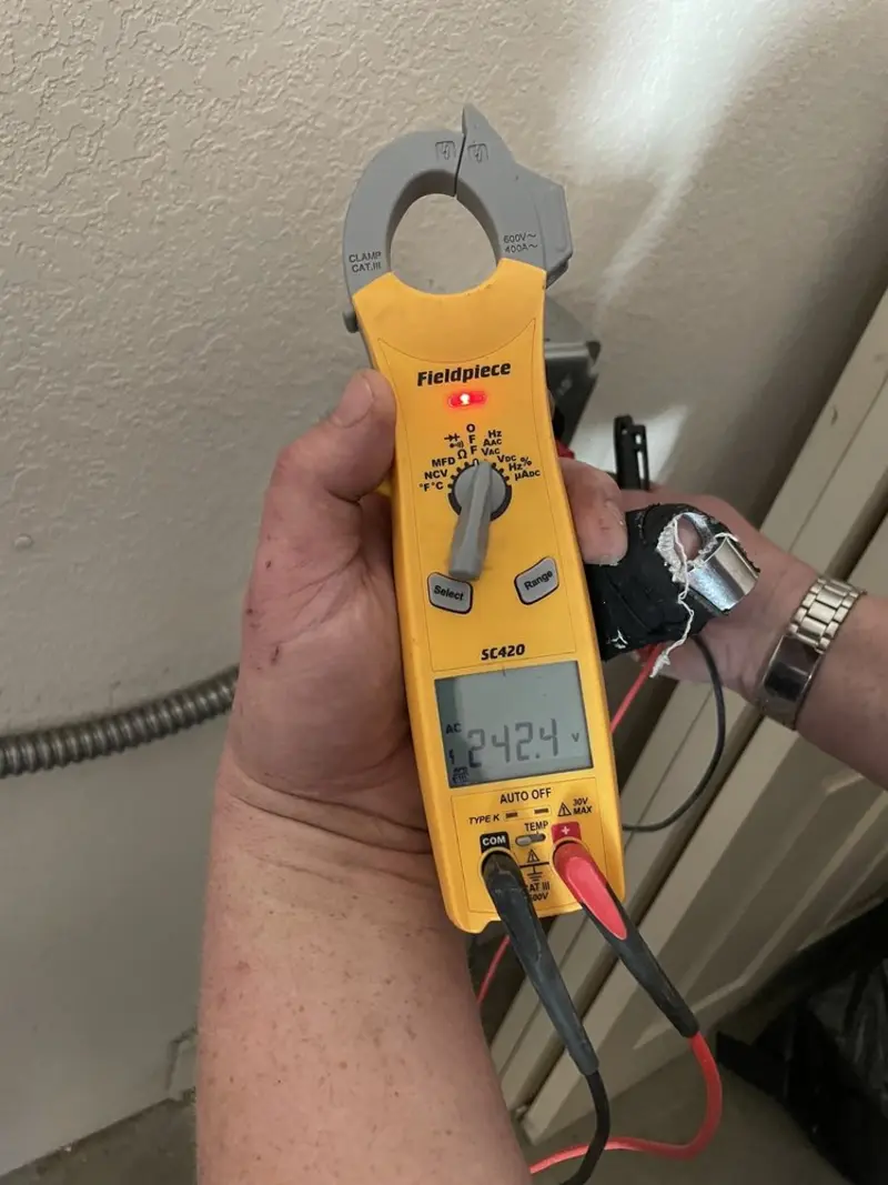 Voltage testing with clamp meter during Generator Installation in Lawndale